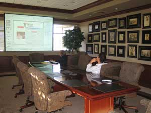 boardroom with drop down screen